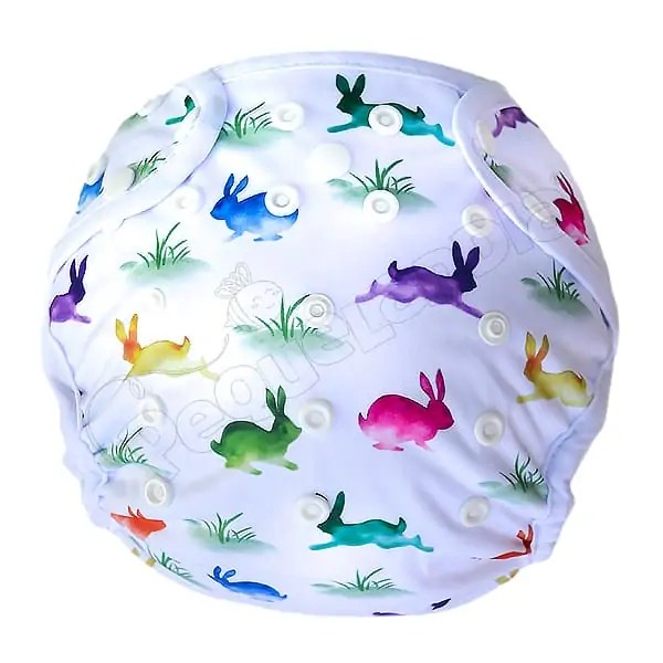 Cobertor Borde Blanco Conejitos Colores con Barrera en Piernas