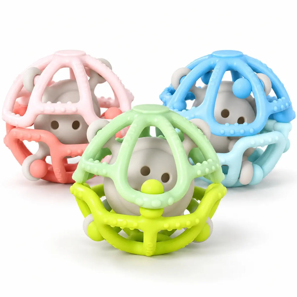 Mordedor pelota de silicona con cascabel para bebé en colores surtidos